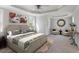 Spacious main bedroom with neutral tones, tray ceilings, and multiple windows for ample natural light at 912 Sethcreek Dr, Fuquay Varina, NC 27526