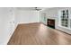 Bright living room with a fireplace and large windows offering lots of natural light at 100 Ampad Ct, Cary, NC 27513