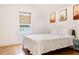 Bright bedroom featuring a comfortable bed, natural light and tasteful decor at 1008 North St, Durham, NC 27701