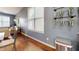 Open floor plan dining room featuring lots of natural light and hardwood floors at 11 Balboa Pkwy, Clayton, NC 27520