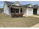 Charming single story home featuring a one-car garage and manicured front lawn at 11 Balboa Pkwy, Clayton, NC 27520