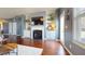 Cozy living room with built-in shelving, fireplace, and hardwood floors at 11 Balboa Pkwy, Clayton, NC 27520