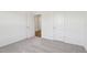 Bedroom features neutral carpet, white walls, and a bright window at 112 Oat Grain Ct, Clayton, NC 27520