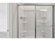 Close-up of a shower with sliding glass doors and built in shelves at 112 Oat Grain Ct, Clayton, NC 27520