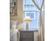Bedroom featuring an end table with lamp next to a window with decorative curtains at 1120 N Roxboro St, Durham, NC 27701