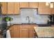 Spacious kitchen with stainless steel appliances, granite countertops, and a stylish backsplash at 1120 N Roxboro St, Durham, NC 27701