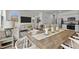 Combined living space with contemporary furnishings, open layout, and an abundance of natural light at 1120 Tofino Dr, Durham, NC 27704