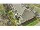 Aerial shot of townhomes featuring well-maintained yards, patios, and roofs within a residential community at 11251 Lofty Heights Pl, Raleigh, NC 27614