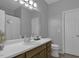 Well-lit bathroom features a single vanity, toilet, and shower/tub combo with neutral decor at 11251 Lofty Heights Pl, Raleigh, NC 27614