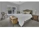 Cozy bedroom with soft natural light, carpet, and an inviting atmosphere at 11251 Lofty Heights Pl, Raleigh, NC 27614