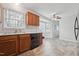 Well-designed kitchen flowing into the dining area, with bright, natural light at 114 Marshay Meadow Rd, Youngsville, NC 27596