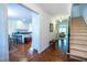 Entryway featuring hardwood floors, staircase, and view to the kitchen and living room at 114 Montrose Dr # 114, Durham, NC 27707