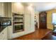 Kitchen with stainless steel appliances and white cabinetry at 114 Montrose Dr # 114, Durham, NC 27707