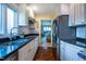 Modern kitchen with stainless steel appliances, and white cabinetry at 114 Montrose Dr # 114, Durham, NC 27707