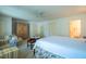 Large main bedroom suite featuring cozy seating, neutral decor, and ensuite bathroom at 114 Montrose Dr # 114, Durham, NC 27707