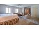 Inviting main bedroom with natural light, hardwood furniture, and relaxing seating area at 114 Montrose Dr # 114, Durham, NC 27707