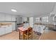Functional kitchen with bright cabinetry, stainless steel appliances, and a cozy breakfast nook at 116 Lakewood Dr, Wendell, NC 27591