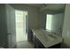 Bathroom featuring double sink vanity with dark cabinets and a large mirror at 118 Fairwinds Drive Dr, Lillington, NC 27546
