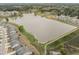 Community lakeside living with walking trail and green spaces surrounding homes and large lake at 1207 Bluewater Way, Durham, NC 27703