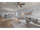 Open concept living space connects kitchen, dining, and living areas for easy entertaining at 1207 Bluewater Way, Durham, NC 27703