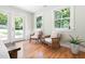 Bright bedroom with natural light and hardwood floors at 122 W Union St, Hillsborough, NC 27278