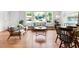 Open concept living space with hardwood floors and stylish furniture at 122 W Union St, Hillsborough, NC 27278