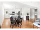 Seamless transition from dining to kitchen in this open and airy living space at 122 W Union St, Hillsborough, NC 27278
