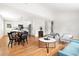 Open-concept living area flowing into a modern kitchen, perfect for entertaining at 122 W Union St, Hillsborough, NC 27278