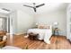 Spacious main bedroom with plenty of natural light and wood flooring at 122 W Union St, Hillsborough, NC 27278