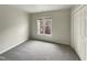 Bright bedroom with closet and a window offering outdoor views at 12316 Amoretto Way, Raleigh, NC 27613