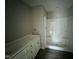 Modern bathroom with white cabinets and a shower stall at 129 Grace Pond Ave, Benson, NC 27504