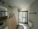 Bathroom featuring a modern shower and sleek fixtures at 129 Grace Pond Ave, Benson, NC 27504