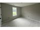 Bright bedroom featuring natural light, enhancing the spacious feel, and neutral walls at 129 Grace Pond Ave, Benson, NC 27504