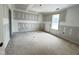 Bedroom during construction featuring natural light from window, offering a bright, airy space at 129 Grace Pond Ave, Benson, NC 27504