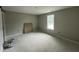 Comfortable bedroom with neutral walls, a window, and natural light at 129 Grace Pond Ave, Benson, NC 27504