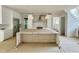 Modern kitchen featuring an island, stainless steel appliances, and a pantry at 1309 Sanctuary Pond Dr, Raleigh, NC 27603