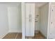 Bright laundry area features white cabinets and space for washer and dryer hookups at 1309 Sanctuary Pond Dr, Raleigh, NC 27603
