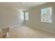 Bright room with sunlight streaming through the windows and a new toilet to be installed at 1309 Sanctuary Pond Dr, Raleigh, NC 27603