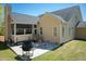 Well-maintained backyard with a patio, outdoor seating, and grill for entertaining at 150 Lystra Ridge Rd, Chapel Hill, NC 27517