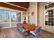 Spacious outdoor dining area with a large table, perfect for entertaining guests and enjoying the scenery at 150 Lystra Ridge Rd, Chapel Hill, NC 27517