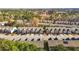 A neatly arranged neighborhood showcasing attractive townhomes, well-kept streets, and beautiful surrounding greenery at 154 Alamosa Pl, Cary, NC 27519