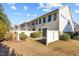 Private backyard with mature landscaping and a white privacy fence, perfect for relaxing outdoors at 154 Alamosa Pl, Cary, NC 27519