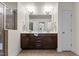 Elegant bathroom with double vanity, granite counters, and decorative accents at 154 Alamosa Pl, Cary, NC 27519