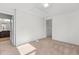 A cozy bedroom featuring neutral carpet, white walls, and ample natural light at 154 Alamosa Pl, Cary, NC 27519