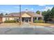 A charming community center featuring stone accents, a welcoming entrance, and accessible parking at 154 Alamosa Pl, Cary, NC 27519