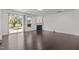 Bright living room featuring fireplace and sliding glass door for seamless indoor/outdoor living at 154 Alamosa Pl, Cary, NC 27519