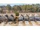 An orderly row of charming townhomes, showcasing well-maintained landscaping and inviting curb appeal at 154 Alamosa Pl, Cary, NC 27519