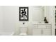 Clean, modern bathroom with sleek fixtures and a minimalist design at 1543 Crescent Townes Way, Raleigh, NC 27604