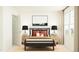Bright bedroom with a modern bed frame, stylish lamps, and a window at 1543 Crescent Townes Way, Raleigh, NC 27604