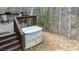 Backyard with a deck and trees in the back at 1808 W Cotton Gin Dr, Clayton, NC 27527